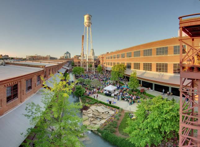 The historic American Tobacco Campus courtyard and water tower in downtown Durham